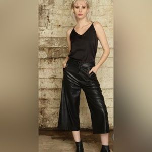 Nancy K black faux leather pants